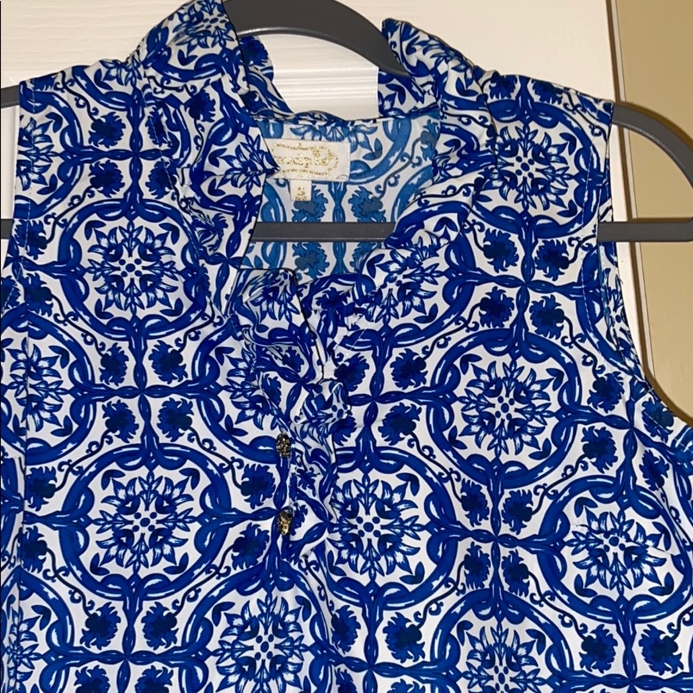 Blue and white ruffled top